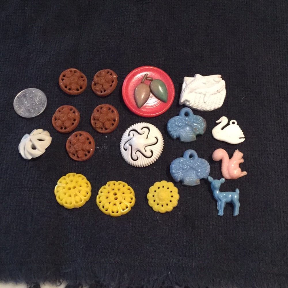 18 vintage buttons.
